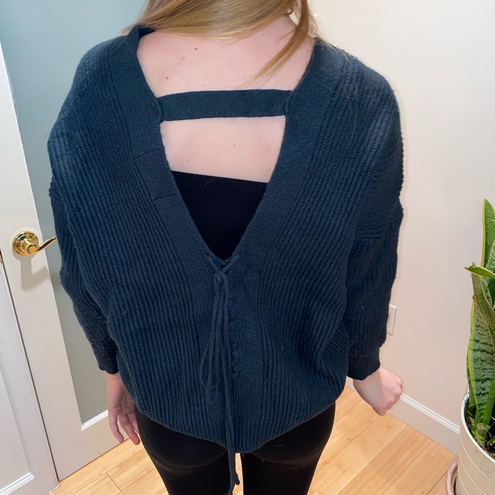 “Lovemarks” dark green sweater